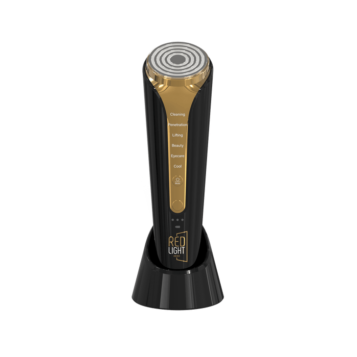 HeroBeauty handheld facial device on its charging base