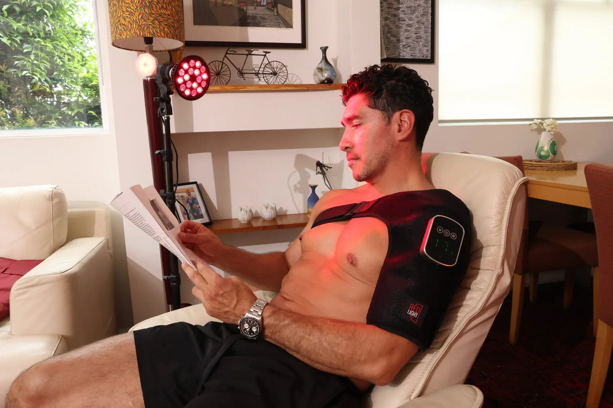 Man seated with HeroSpotlight red light directed at his chest