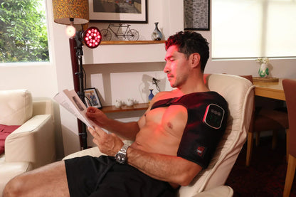 Man seated with HeroSpotlight red light directed at his chest