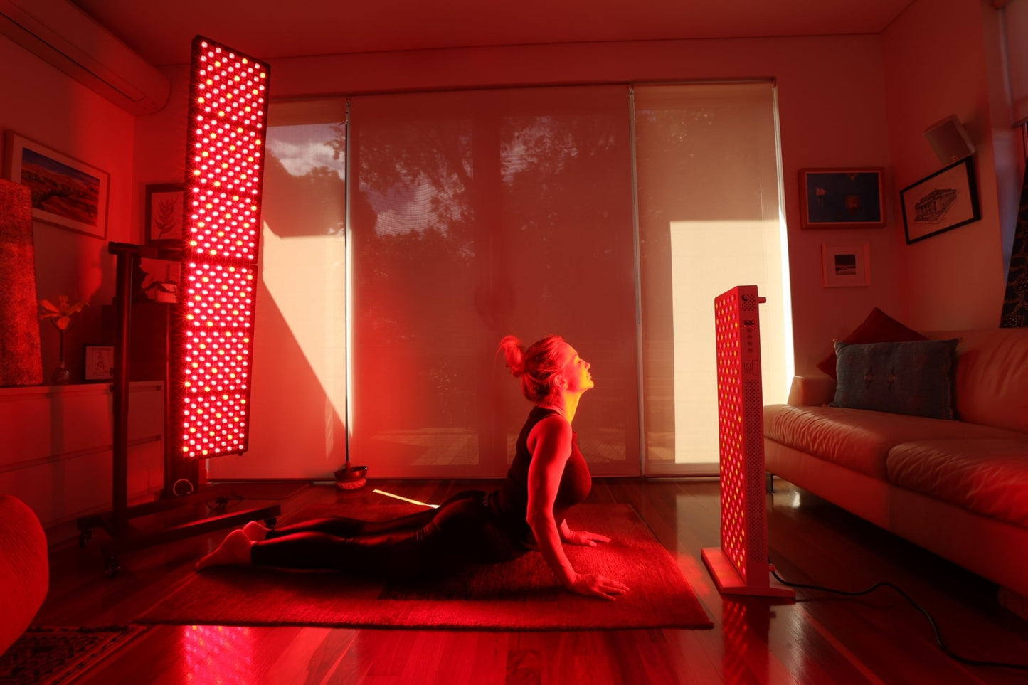 Woman meditating between two Hero300 panels