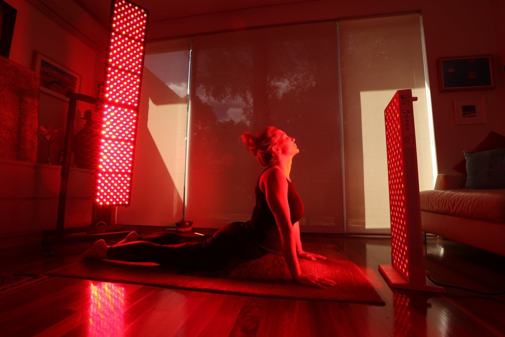 Woman stretching between two Hero300 panels